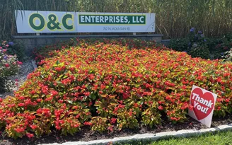 O&C Sign in spring with flowers